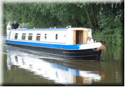 Picture of 60ft narrowboat outside Stenson marina with new boatowner taking boat on commissioning trial