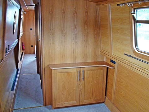 This cabinet was custom built for TV and storage in an open plan saloon on a Stenson narrowboat