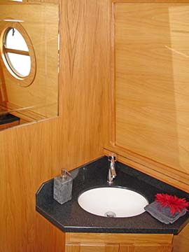 Use of modern solid surface materials are used by Stenson narrowboat where durability and looks are required