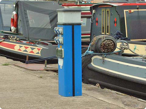 View of one of the service bollards for moored narrowboats at Stenson Marina