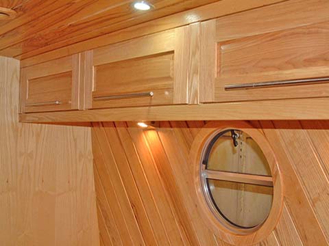 High level cabinets in bedroom cabin on narrowboat