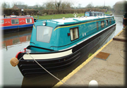 Residential style narrowboat showing how additional cabin space can be provided with extended forward end.