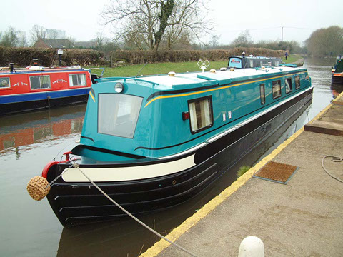 Residential narrowboat built at Stenson showing extended cabin for 5ft wide bed at forward part of cabin